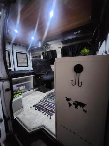 an interior view of an rv with a door at Furgocamper in Lanzarote
