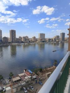 a view of a river with a city in the background at النور للاستثمار العقاري بالمنيل in Cairo