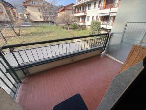 a balcony with a view of a building at La Chimera in Robilante