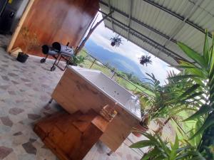 a room with a sink and a view of a mountain at RIGE s Home in Palma +6 photos