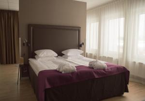 Postel nebo postele na pokoji v ubytování Best Western Plus Park Airport Hotel