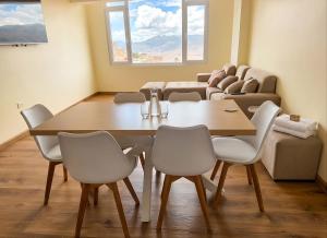 a conference room with a table and chairs at Cusco Nest in Cusco +9 photos