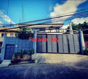 a gate with the words paradise day written on it at McHanns Place in Antipolo
