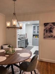 a kitchen and dining room with a table and chairs at Sweet Home in Greenville