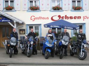 a group of motorcycles parked in front of a restaurant at Pension Ochsen, Gästezimmer in Unadingen in Löffingen