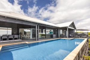 an image of a house with a swimming pool at Baudin Beach House in Gnarabup