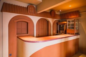 a kitchen with an island in a house at SABLIER by R HOTEL in Osaka