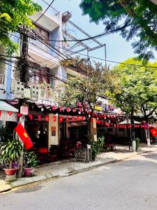 a restaurant on the side of a street at Da Nang Sleepbox & Dorm in Danang