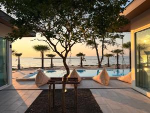 a view of the beach from the house at Wind Haus Beachfront Villa in Ban Hat Chao Samran