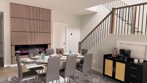 a dining room with a table and chairs at The Sandpearl in Stevensville