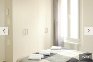 Cama o camas de una habitación en Appartamento Bolzano Centro Talvera