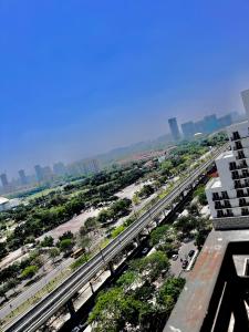 an overhead view of a city with a highway at Stayverse noida in Greater Noida +3 photos