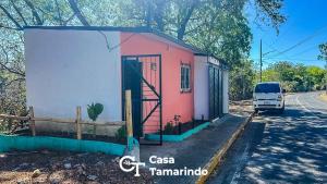 a small house on the side of a road at Casa Tamarindo in Las Peñitas