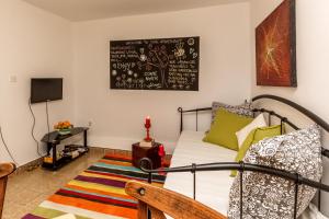 Säng eller sängar i ett rum på Apartment Dalmatian Cottage