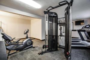 a gym with a treadmill and a exercise bike at Clarion Inn Renton-Seattle in Renton