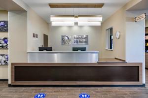 a waiting room at a mission style clinic at MainStay Suites Great Falls Airport in Great Falls