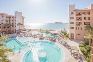 an image of a swimming pool at a resort at Peñasco del Sol Hotel in Puerto Peñasco
