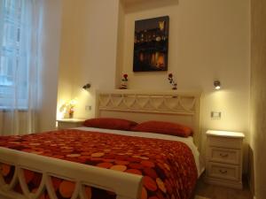 Postel nebo postele na pokoji v ubytování Rooms Boutique Carducci