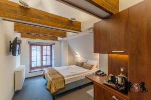 Posteľ alebo postele v izbe v ubytovaní Celestin Residence