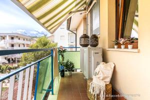 a balcony with a view of a building at Mint House in Vasto
