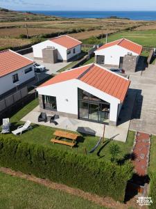 an overhead view of a house with a picnic table at Wine House by Ponta Negra Azores in Altares