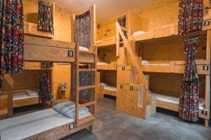a room with several bunk beds in a house at Stay Swanky Hostel in Zagreb +75 photos