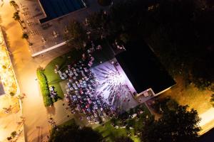 an overhead view of a crowd of people with fireworks at Club del Sole Stork Family Collection in Giulianova +205 photos