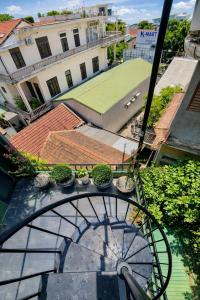 a view of a tennis court from a balcony at Victoria Villa 2 in Hue +34 photos