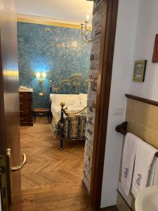 a bathroom with a bed in a room at B&B Dai Toscans in Cividale del Friuli +86 photos