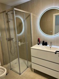 a bathroom with a shower and a sink at casa da Inês in Vieira de Leiria +17 photos