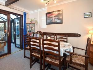 a dining room with a table and chairs at 3 Bed in Penrith oc-89268 in Newton Reigny