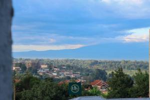 a view of a city from a hill at Executive 1BR with Free WiFi & Netflix in Nyeri