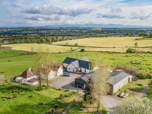 an aerial view of a house in a field at 2 Bed in Bonnybridge oc-90602 in Bonnybridge
