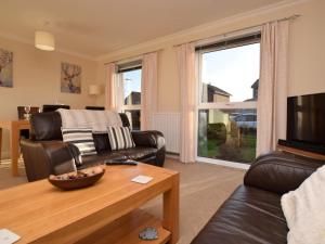 a living room with a couch and a table at 3 Bed in Galashiels oc-76698 in Galashiels