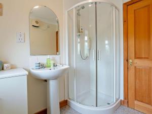 a bathroom with a shower and a sink at 1 Bed in Beauly oc-82778 in Beauly +6 photos
