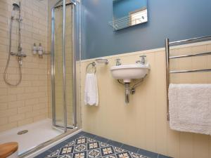 a bathroom with a sink and a shower at 2 Bed in West Linton oc-76383 in West Linton +26 photos