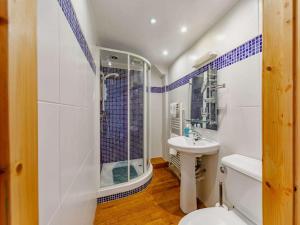 a bathroom with a toilet a sink and a shower at 2 Bed in Appleby-in-westmorland oc-87537 in Long Marton +12 photos