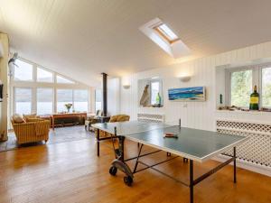 a living room with a ping pong table in it at 6 Bed in Ullapool oc-ca259 in Ullapool +30 photos