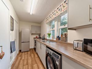 a kitchen with a washer and dryer at 2 Bed in Maybole oc-96012 in Maybole