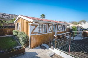 a tiny house being constructed in a yard at Chalet in Le Teich