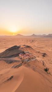 an aerial view of a house in the desert at Riad Belvedere in Ouzina