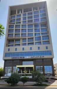 a tall building with the name of kazan at england at Karam Al Balad Hotel in Jeddah