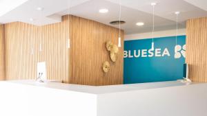 a lobby with a blueza bar on the wall at BLUESEA Costa Serena in Torremolinos