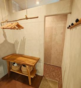 a bathroom with a wooden table and a shower at local diamond in Guía de Isora