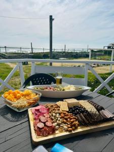 a table with a variety of food on it at Ilocavistamar in Iloca