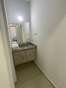 a bathroom with a sink and a mirror at La Buena Memoria in San Juan +48 photos