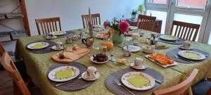a table with plates of food on top of it at Lindenhof Helmke in Schellerten +17 photos