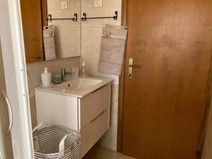 a bathroom with a sink and a mirror at Casa Selia in Cecina +42 photos