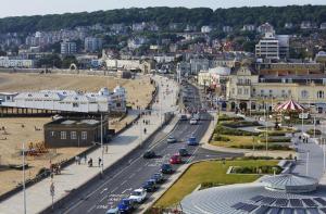 a view of a city with cars driving down a street at UNLIMITED-PEACE PRIVATE STUDIO APARTMENTs in Weston-super-Mare