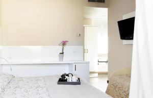 TV a/nebo společenská místnost v ubytování Primavera + 30 fotografií